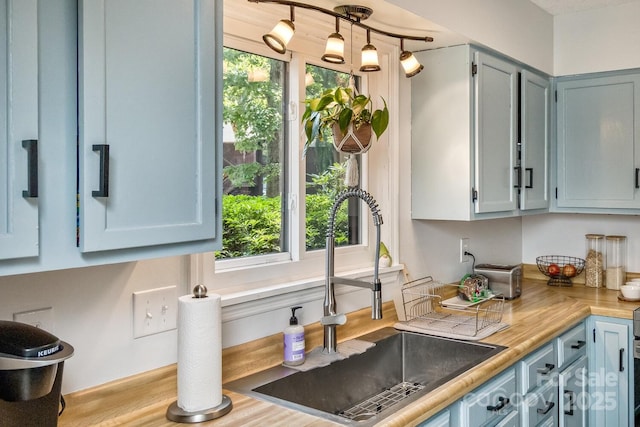 107 Cedar Forest Trl Unit 107, Asheville, NC 28803 - kitchen with plenty of natural light, light countertops, and blue cabinets