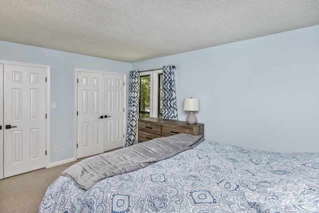 107 Cedar Forest Trl Unit 107, Asheville, NC 28803 - bedroom with carpet floors and a textured ceiling
