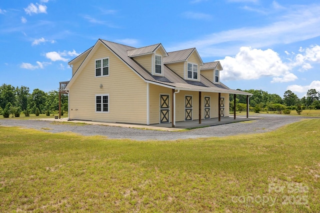 585 Clearwater Lake Rd, Kershaw, SC 29067 - view of front of house featuring a front lawn and a metal roof