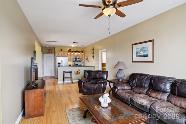 585 Clearwater Lake Rd, Kershaw, SC 29067 - living room featuring a ceiling fan and light wood-style flooring