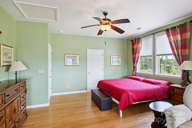 585 Clearwater Lake Rd, Kershaw, SC 29067 - bedroom featuring light wood-style floors, attic access, and a ceiling fan