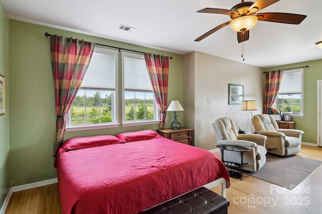 585 Clearwater Lake Rd, Kershaw, SC 29067 - bedroom with light wood-style floors and ceiling fan