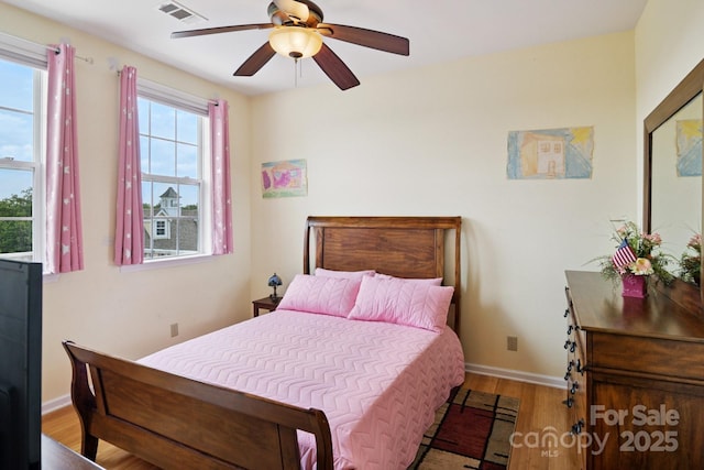 585 Clearwater Lake Rd, Kershaw, SC 29067 - bedroom featuring wood finished floors and a ceiling fan