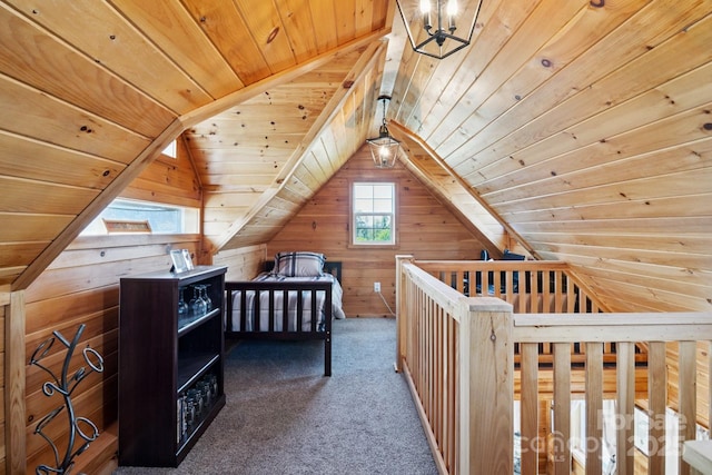585 Clearwater Lake Rd, Kershaw, SC 29067 - carpeted bedroom featuring wood ceiling, vaulted ceiling, wood walls, and a chandelier