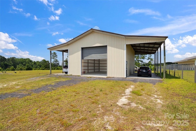 585 Clearwater Lake Rd, Kershaw, SC 29067 - garage featuring a detached garage and driveway