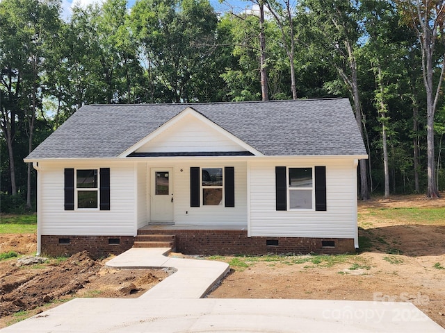 154 Hinton St, Chester, SC 29706 - view of front of home featuring crawl space, roof with shingles, and covered porch
