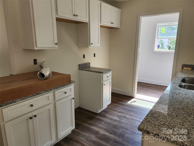 154 Hinton St, Chester, SC 29706 - kitchen with dark wood finished floors, stone countertops, and white cabinets