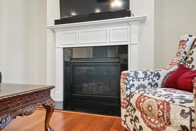 8275 Normandy Rd, Denver, NC 28037 - detailed view of a fireplace and wood finished floors