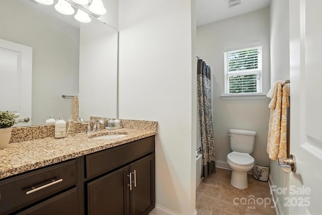 8275 Normandy Rd, Denver, NC 28037 - bathroom featuring vanity, shower / bath combo with shower curtain, and tile patterned flooring