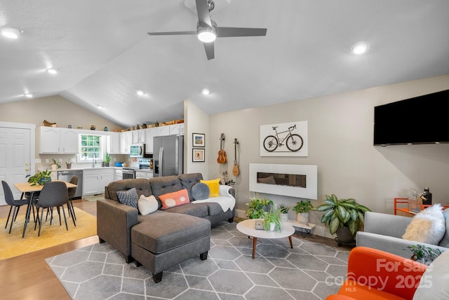 12 Buckshot Ridge Dr, Asheville, NC 28804 - living room featuring lofted ceiling, a ceiling fan, wood finished floors, and recessed lighting