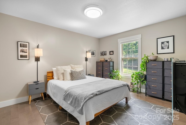 12 Buckshot Ridge Dr, Asheville, NC 28804 - bedroom featuring dark wood finished floors and baseboards