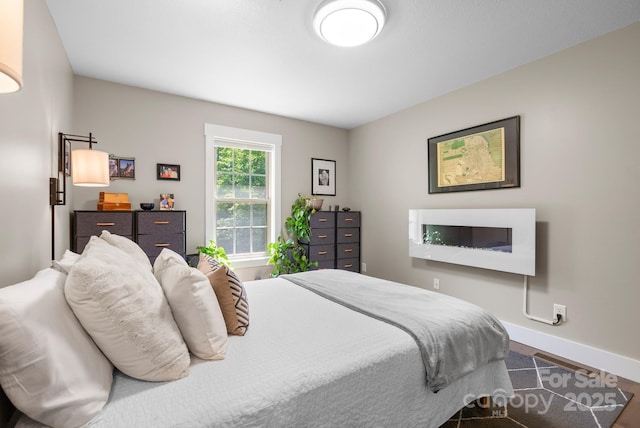 12 Buckshot Ridge Dr, Asheville, NC 28804 - bedroom with baseboards and wood finished floors
