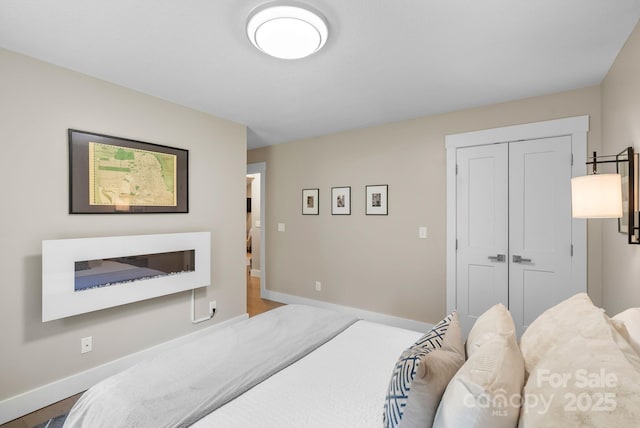 12 Buckshot Ridge Dr, Asheville, NC 28804 - bedroom with baseboards and a closet
