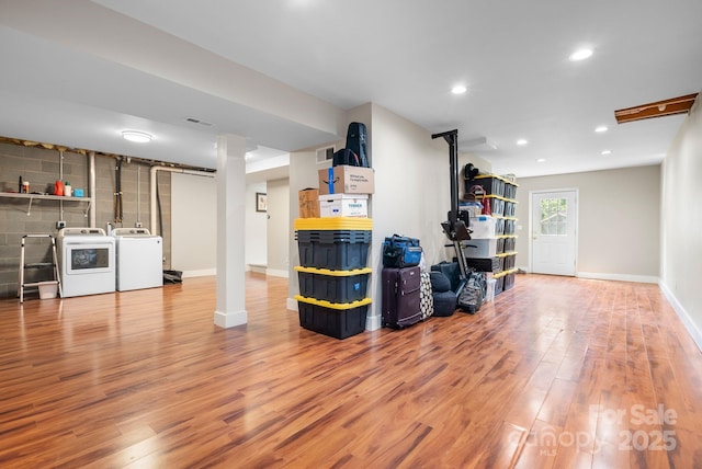 12 Buckshot Ridge Dr, Asheville, NC 28804 - living room with washer and clothes dryer, wood finished floors, and recessed lighting