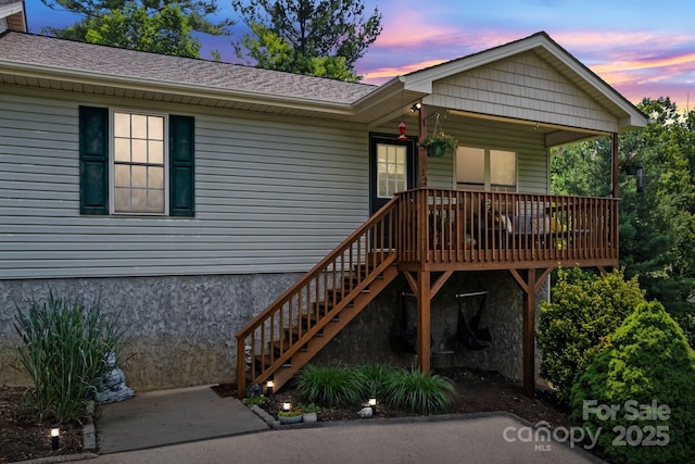 12 Buckshot Ridge Dr, Asheville, NC 28804 - view of front facade featuring stairs and roof with shingles