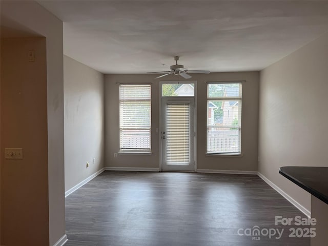 6112 Creft Cir, Indian Trail, NC 28079 - empty room with dark wood finished floors and ceiling fan