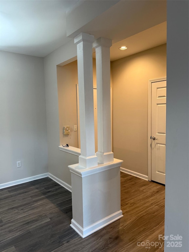 6112 Creft Cir, Indian Trail, NC 28079 - hall with dark wood-style floors, recessed lighting, and decorative columns