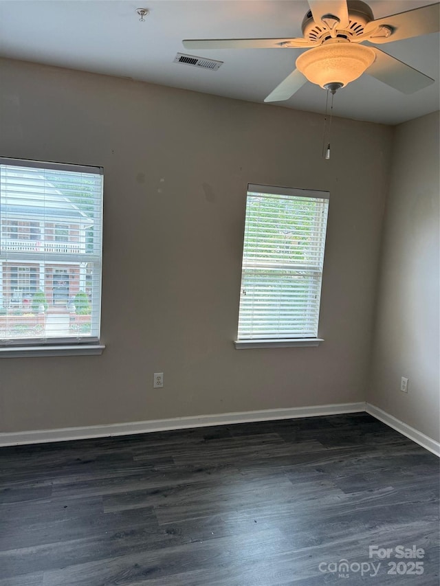 6112 Creft Cir, Indian Trail, NC 28079 - spare room featuring healthy amount of natural light, dark wood finished floors, and a ceiling fan
