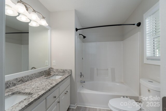 1782 Oakdale Rd, Rock Hill, SC 29730 - bathroom with double vanity, shower / bathtub combination, and wood finished floors