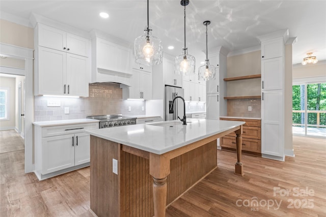 510 State Rd, China Grove, NC 28023 - kitchen with open shelves, recessed lighting, tasteful backsplash, light wood-style floors, and light countertops
