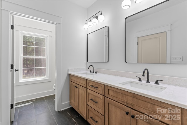 510 State Rd, China Grove, NC 28023 - full bathroom with double vanity and tile patterned flooring