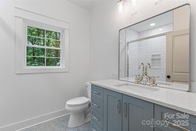 510 State Rd, China Grove, NC 28023 - bathroom featuring vanity, speckle patterned floor, and tiled shower