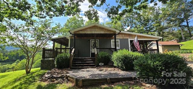 414 Pine Cove Rd, Old Fort, NC 28762 - view of front of house featuring covered porch