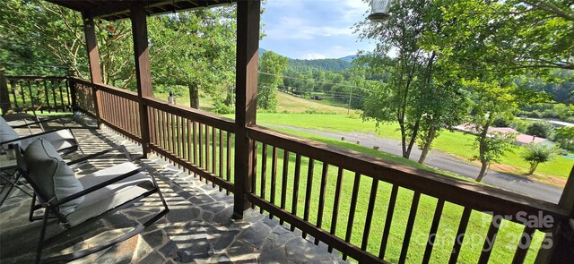 414 Pine Cove Rd, Old Fort, NC 28762 - wooden terrace with a mountain view and a yard