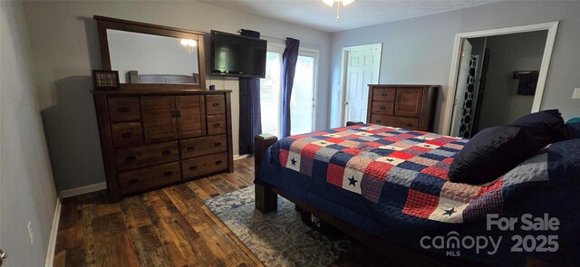 414 Pine Cove Rd, Old Fort, NC 28762 - bedroom featuring dark wood-style floors and baseboards