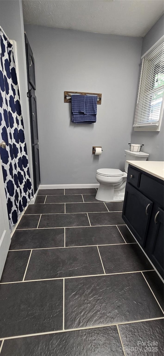 414 Pine Cove Rd, Old Fort, NC 28762 - full bathroom with vanity, a shower with shower curtain, and tile patterned floors