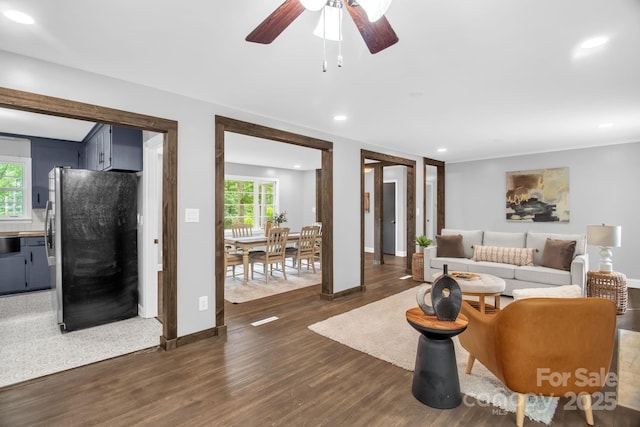 1623 Lumarka Dr, Charlotte, NC 28212 - living area with recessed lighting, dark wood-style flooring, and a ceiling fan