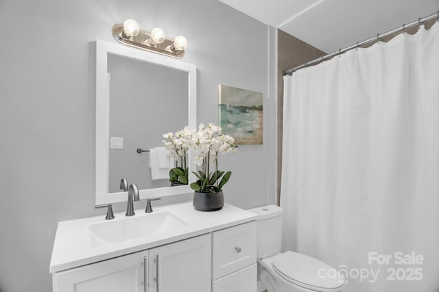 1623 Lumarka Dr, Charlotte, NC 28212 - bathroom with vanity and a shower with curtain