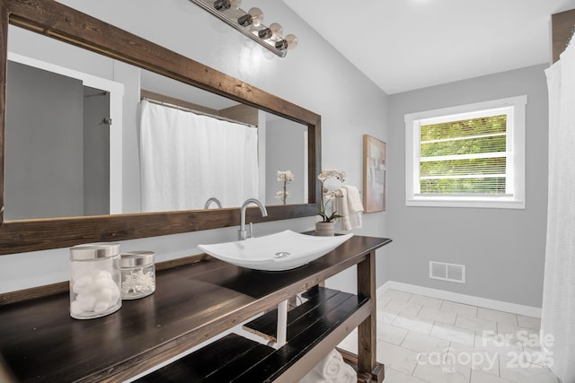 1623 Lumarka Dr, Charlotte, NC 28212 - full bath featuring vanity and tile patterned floors