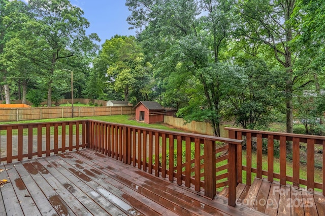 1623 Lumarka Dr, Charlotte, NC 28212 - deck with a storage unit, a fenced backyard, and view of scattered trees