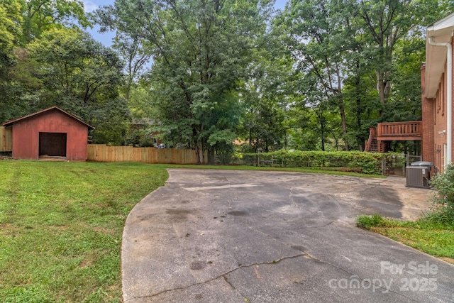 1623 Lumarka Dr, Charlotte, NC 28212 - view of yard with a storage shed and view of scattered trees
