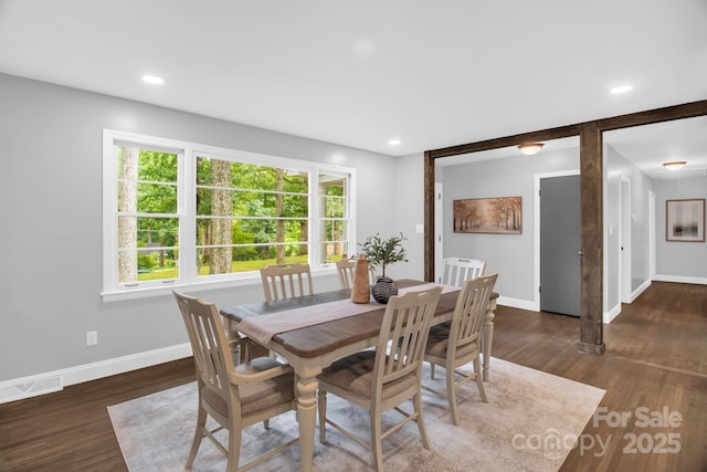 1623 Lumarka Dr, Charlotte, NC 28212 - dining area with healthy amount of natural light, wood finished floors, and recessed lighting