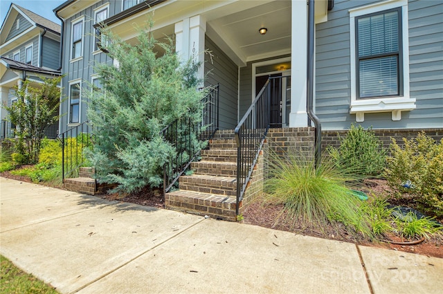 10149 Meeting House Dr NW, Huntersville, NC 28078 - entrance to property with board and batten siding and covered porch