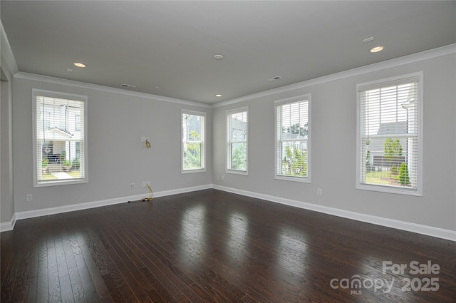 10149 Meeting House Dr NW, Huntersville, NC 28078 - spare room featuring ornamental molding, dark wood-type flooring, and recessed lighting