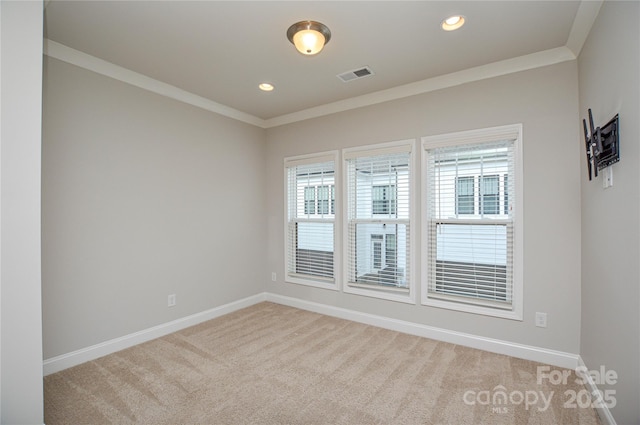 10149 Meeting House Dr NW, Huntersville, NC 28078 - spare room featuring light colored carpet, ornamental molding, and recessed lighting