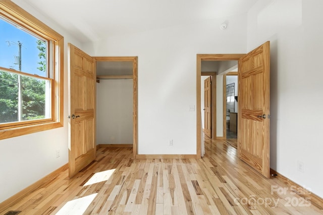 109 Azalea Ave, Swannanoa, NC 28778 - unfurnished bedroom with light wood-style floors and a closet