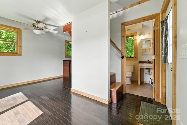 109 Azalea Ave, Swannanoa, NC 28778 - empty room with dark wood finished floors, ceiling fan, and stairway