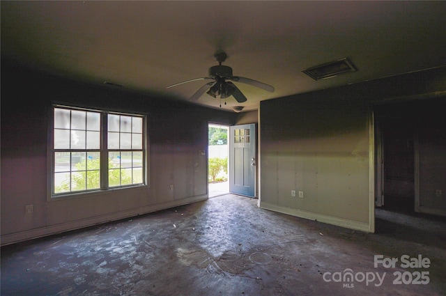 551 Sylvan St SW, Concord, NC 28025 - empty room with concrete flooring and a ceiling fan