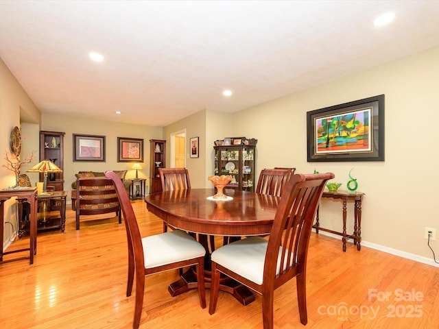1047 Honeybee Trl, Fort Mill, SC 29715 - dining room with light wood-style flooring and recessed lighting