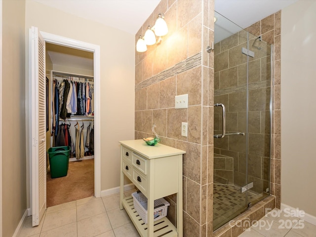 1047 Honeybee Trl, Fort Mill, SC 29715 - full bathroom with tile patterned flooring, a shower stall, and a spacious closet