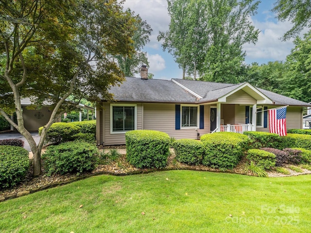 1047 Honeybee Trl, Fort Mill, SC 29715 - single story home with a front yard, a chimney, and covered porch