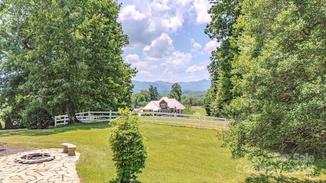 74 Challedon Dr, Candler, NC 28715 - view of yard with a fire pit, a mountain view, and a rural view