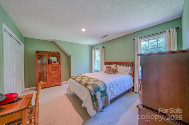 74 Challedon Dr, Candler, NC 28715 - bedroom featuring carpet floors, recessed lighting, a textured ceiling, and a closet