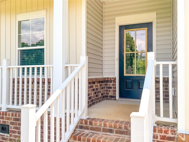1542 Antioch Dr, Conover, NC 28613 - property entrance featuring brick siding and a porch