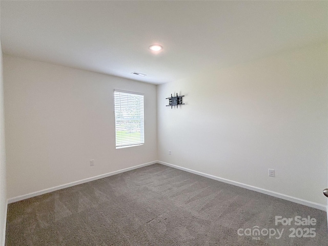 1542 Antioch Dr, Conover, NC 28613 - carpeted spare room with baseboards
