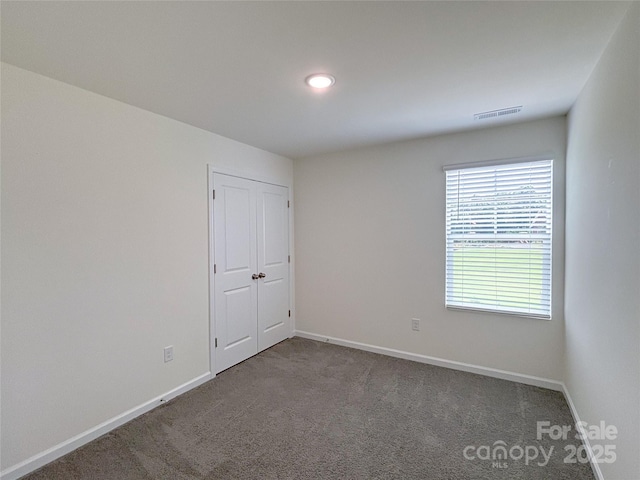 1542 Antioch Dr, Conover, NC 28613 - carpeted spare room featuring baseboards and recessed lighting